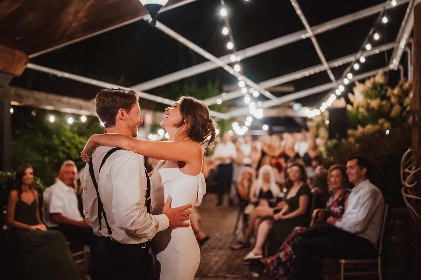 Wedding couple dancing and laughing