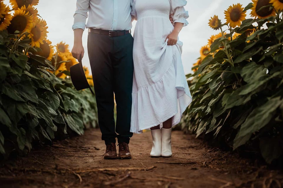 Cassandra and Duane during a sunflower photography session