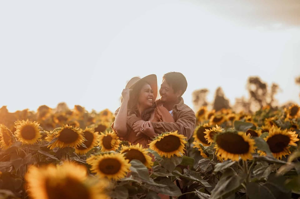 Nicole and Abrena during a sunflower photography session