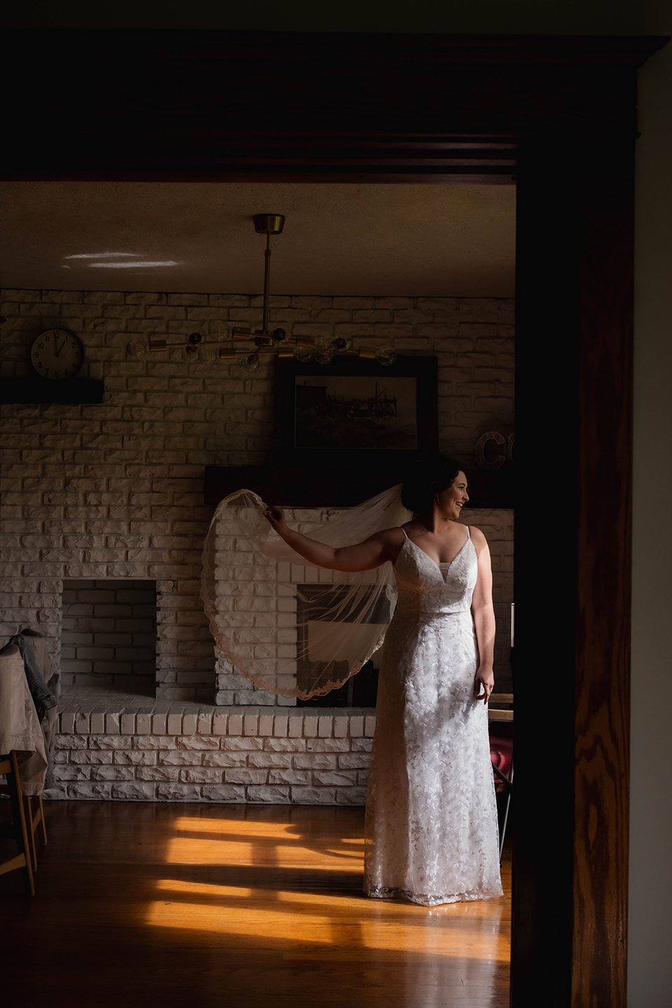 Bride and groom holding each other during a quiet wedding portrait